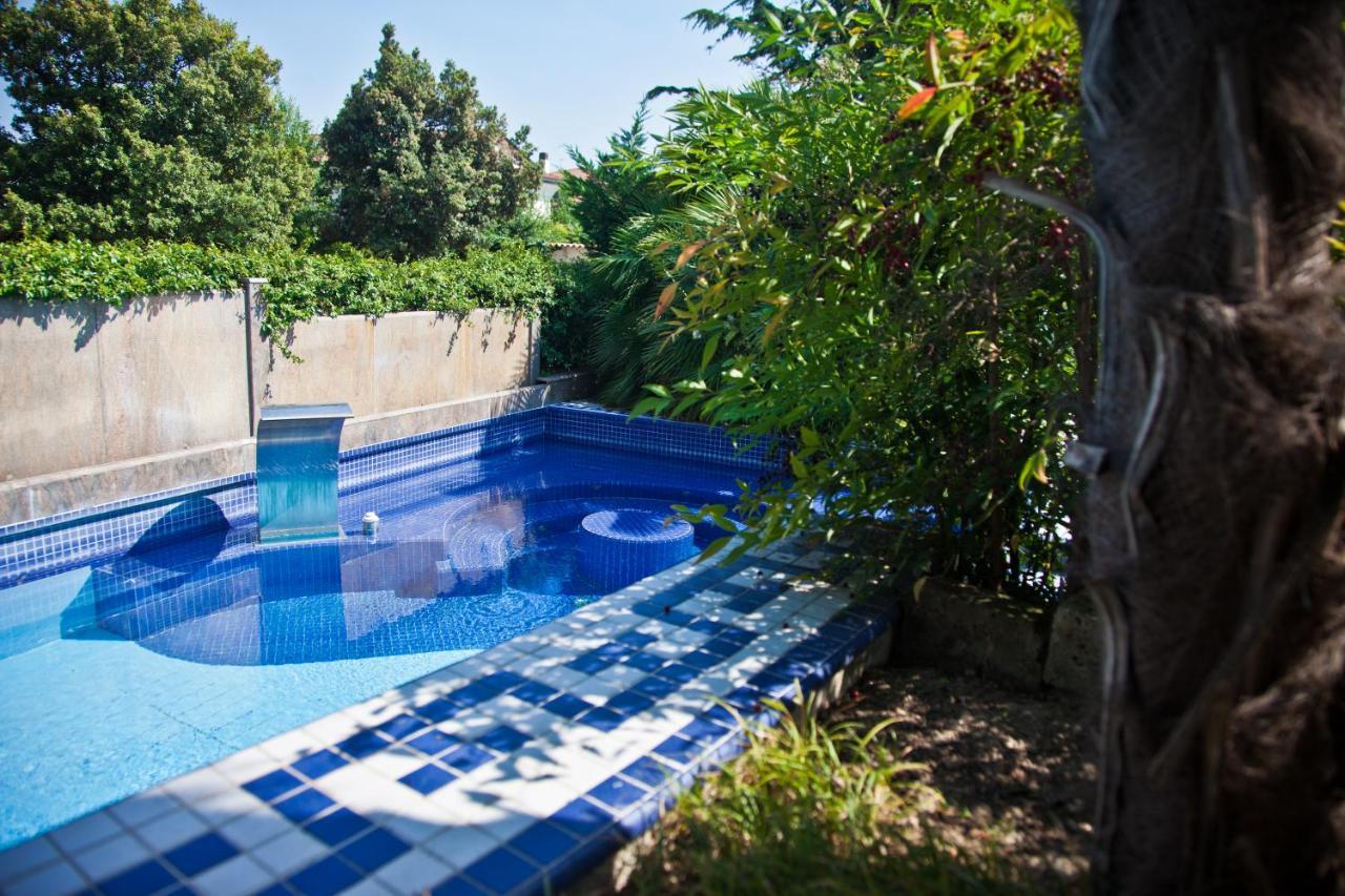 Abano Ritz Hotel Terme Abano Terme Esterno foto A swimming pool in a garden