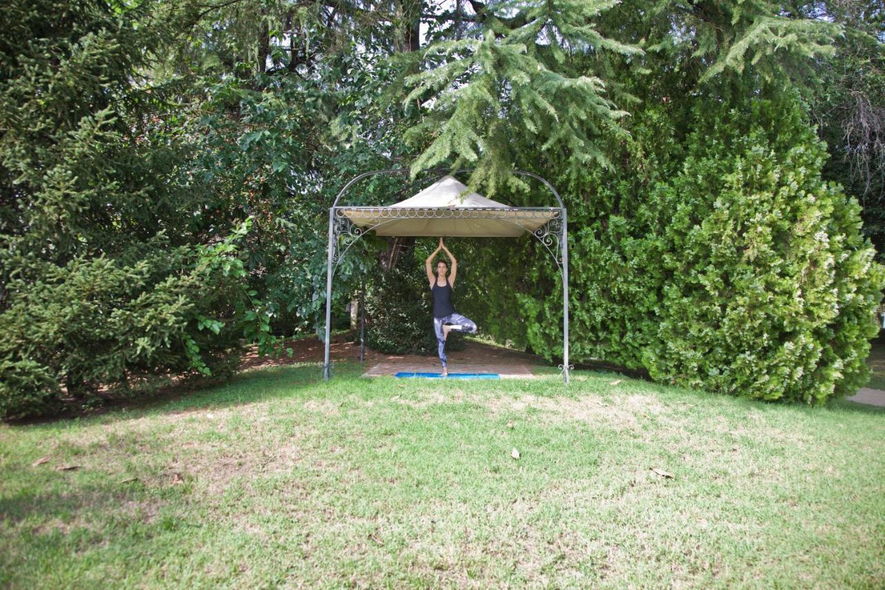 Abano Ritz Hotel Terme Abano Terme Esterno foto A woman practicing yoga at the Yoga Sanctuary